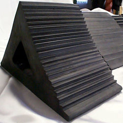 Industrial rubber wedge for stacking objects